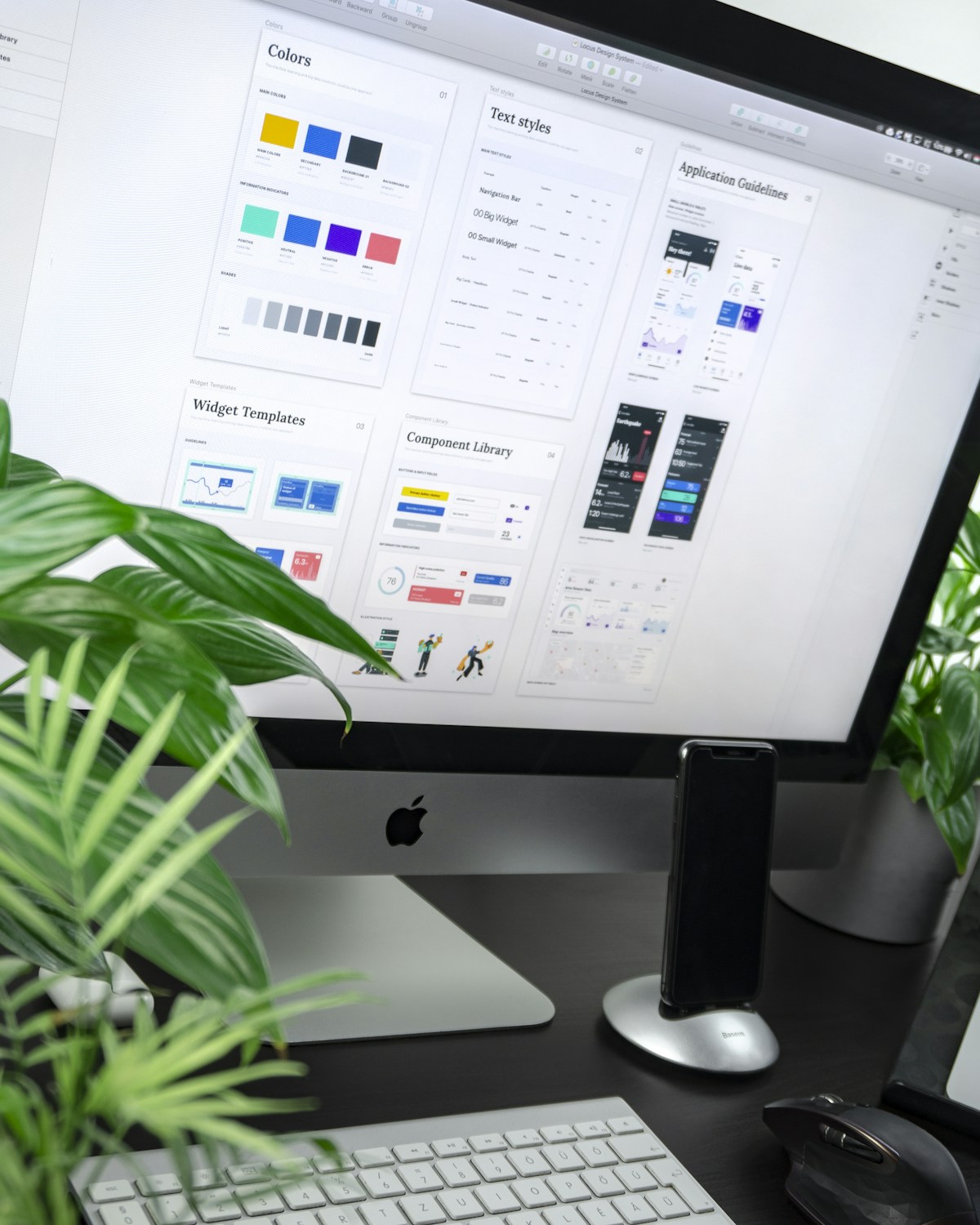 Design desk with typography proofs and layout explorations